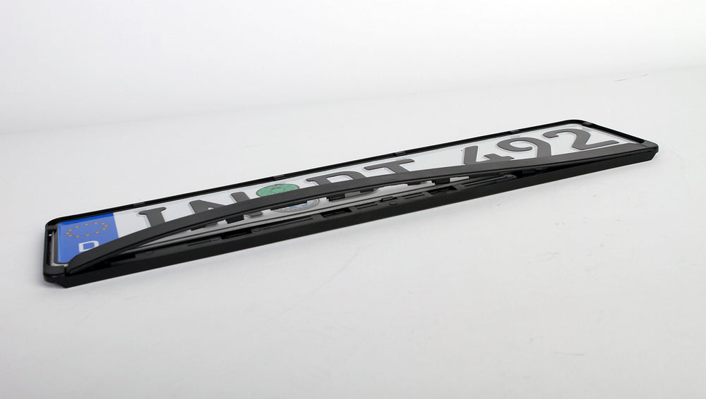 European License Plates standard black holder fits-eu-plates-4-4x20-5in demonstrates precise plate sizing