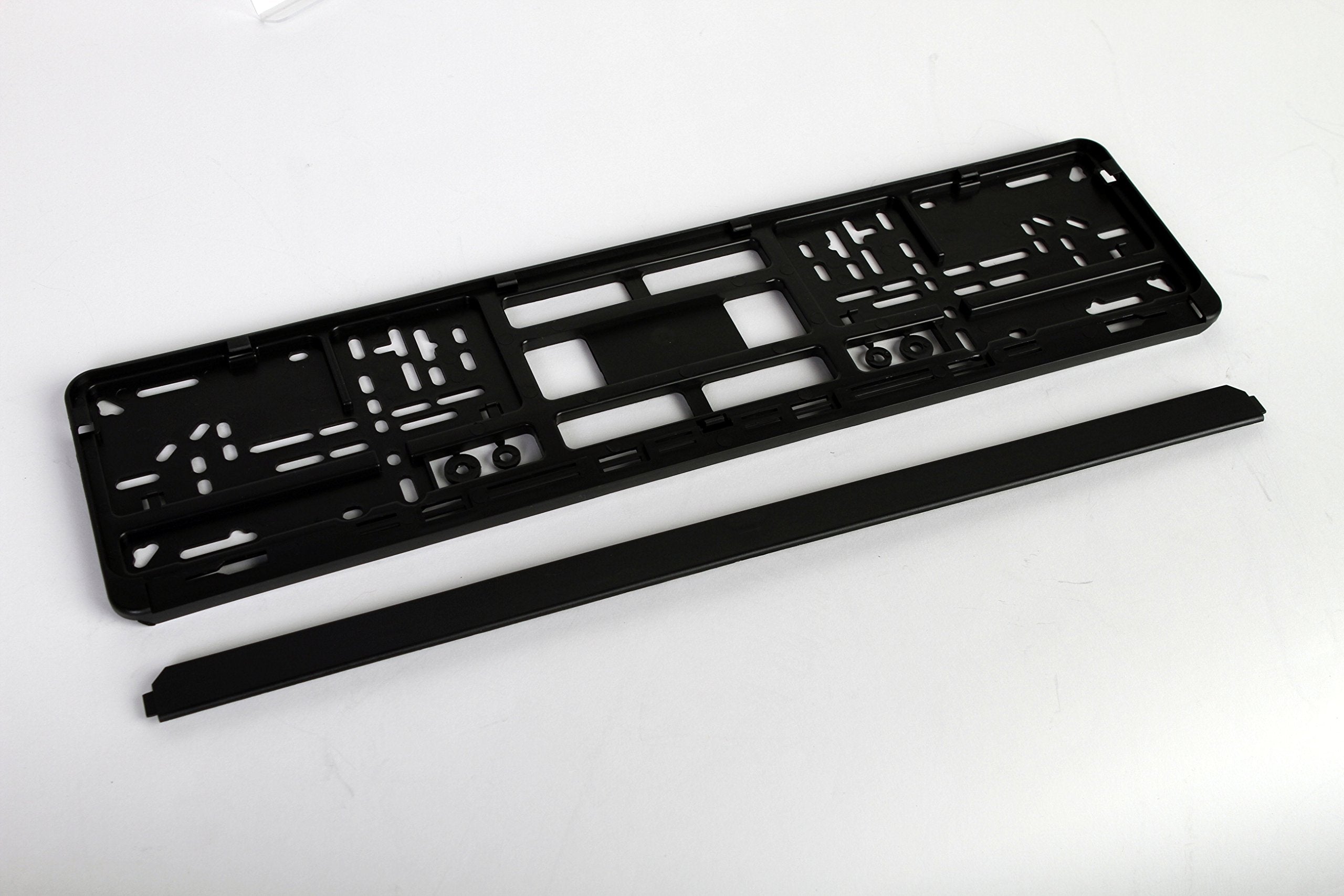 European License Plates standard black holder hole-patterns close-up illustrates versatile mounting options