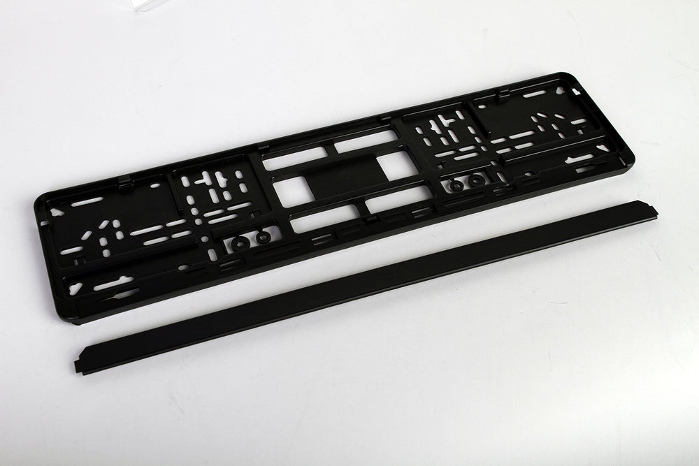 European License Plates standard black holder hole-patterns close-up illustrates versatile mounting options