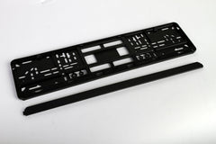 European License Plates standard black holder hole-patterns close-up illustrates versatile mounting options