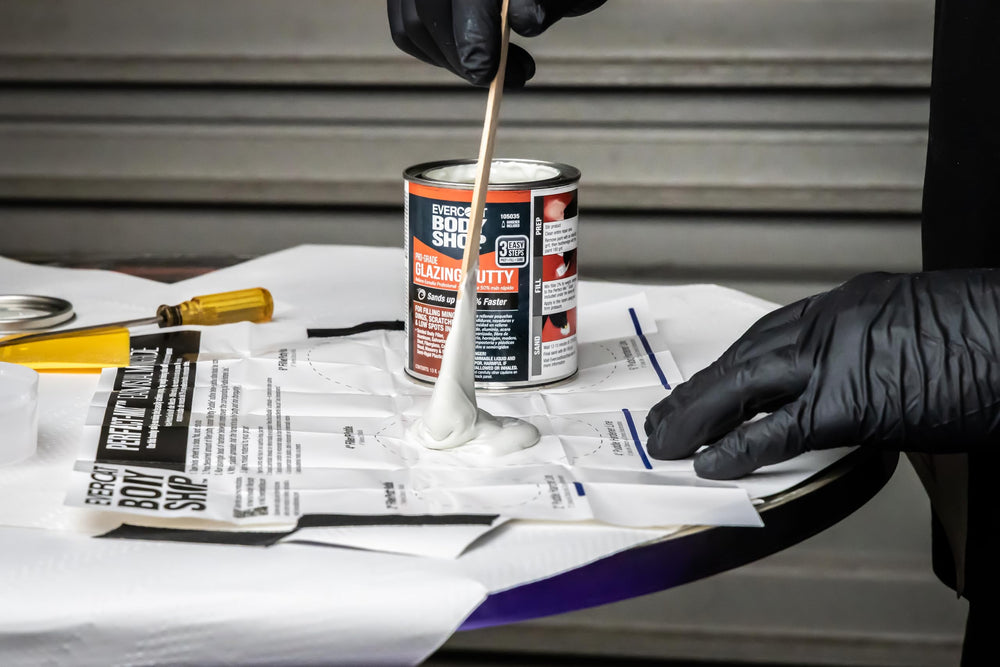 EVERCOAT Body Shop 105035 glazing putty application close-up shows smooth, even finishing.