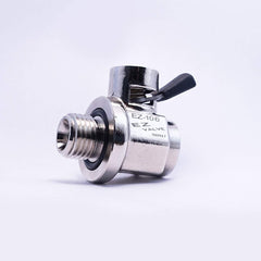 EZ Oil Drain Valve installed in engine bay highlighting compact, durable design.