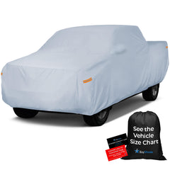EzyShade 10-layer truck cover protecting a pickup from sun and rain.