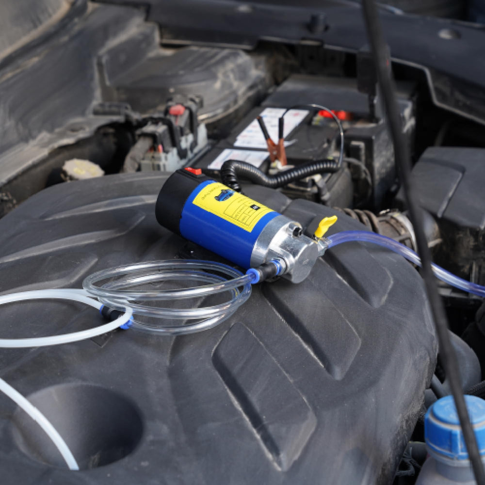 FAITIO engine oil extractor pump in action for fast oil removal