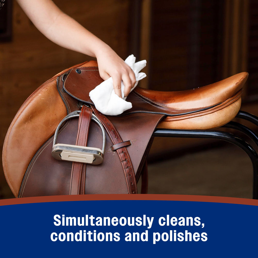 Soft cloth applying Farnam Saddle Soap for simple, single-step care.
