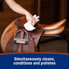 Soft cloth applying Farnam Saddle Soap for simple, single-step care.