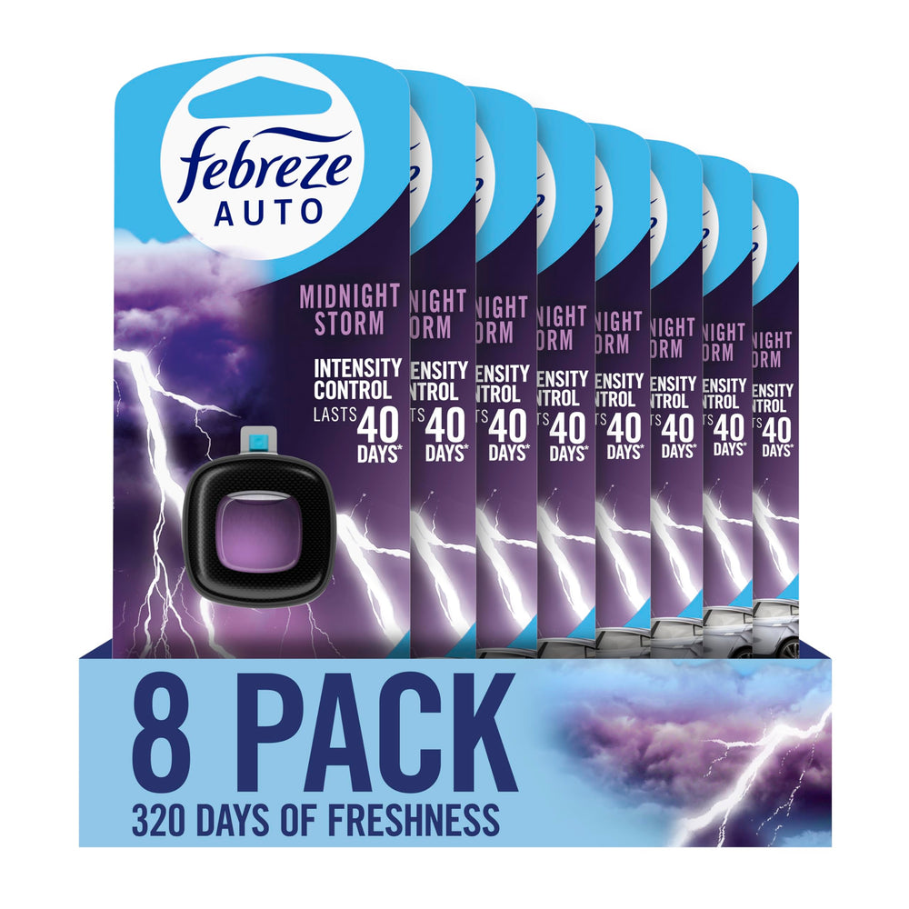Febreze Auto Midnight Storm vent clip attached to a car vent delivering lasting freshness.