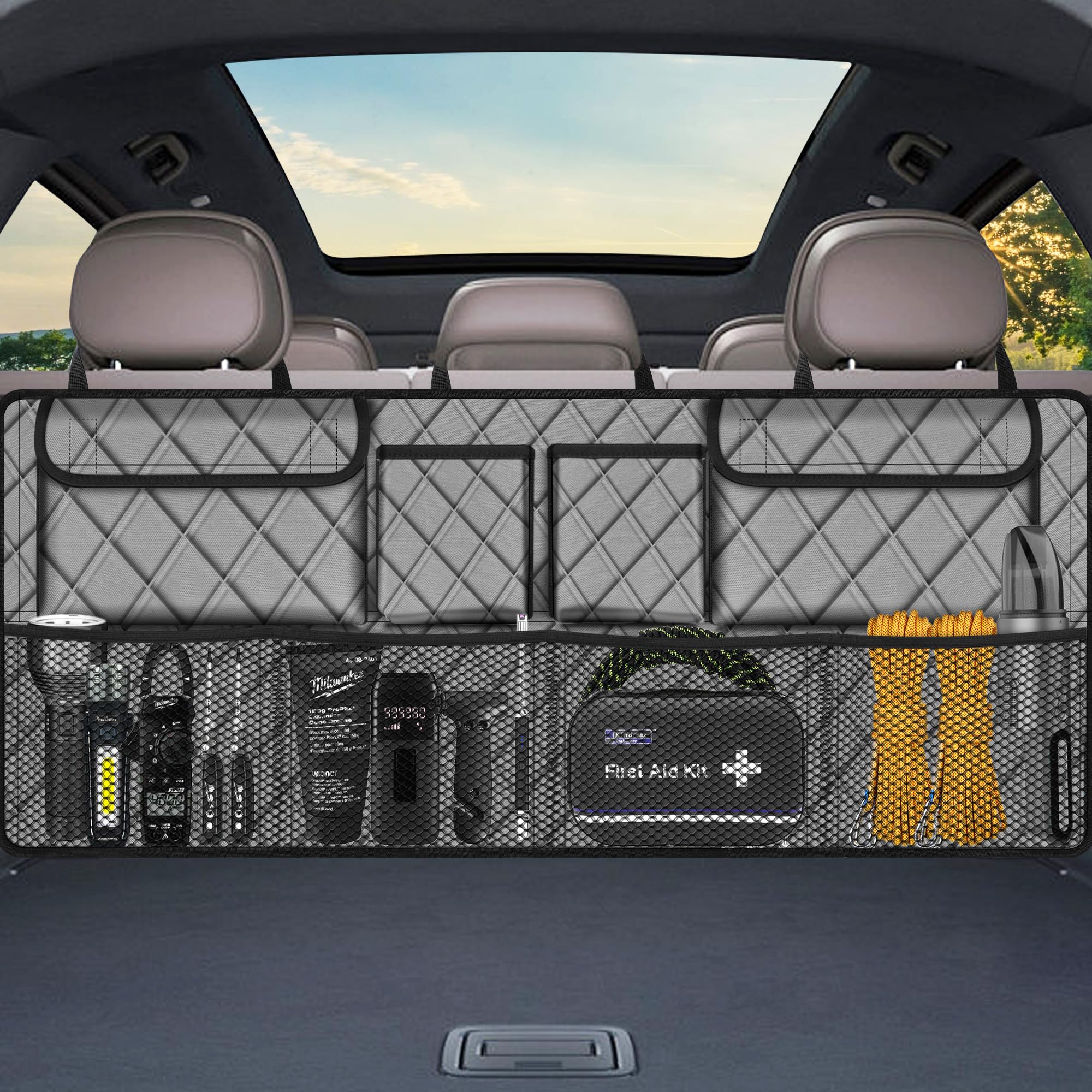 Femuar car trunk organizer in a car trunk with large capacity for groceries.