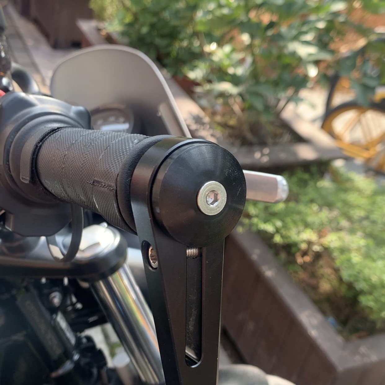 FENRIR bar end mirror adapter on Ninja 400 for secure, streamlined mounting.