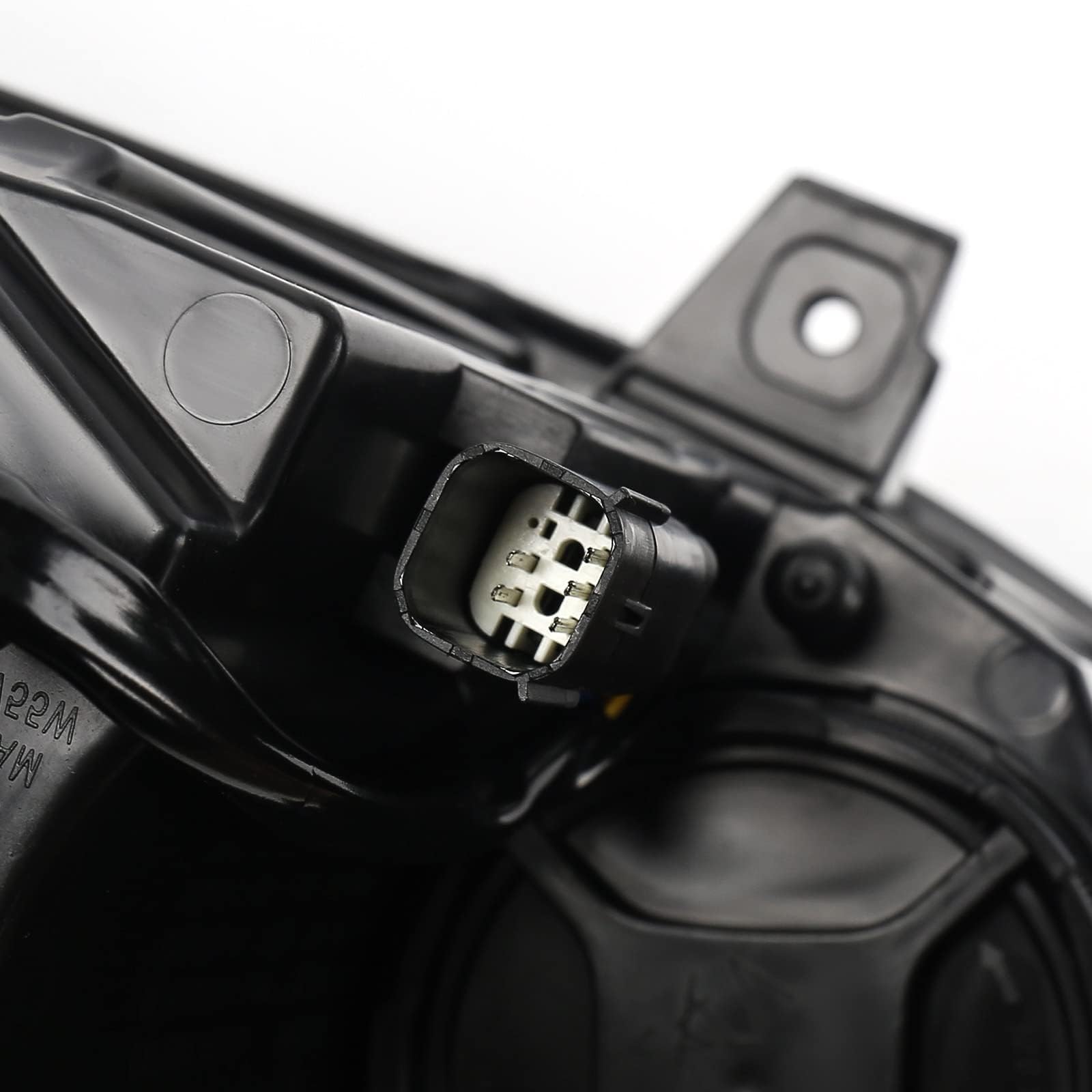 Right-side headlight assembly supports proper alignment for reliable illumination.