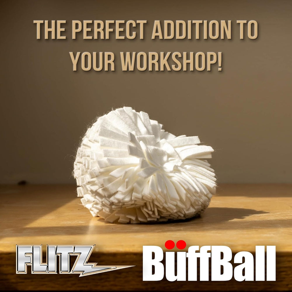Polishing ball in use on painted surface.