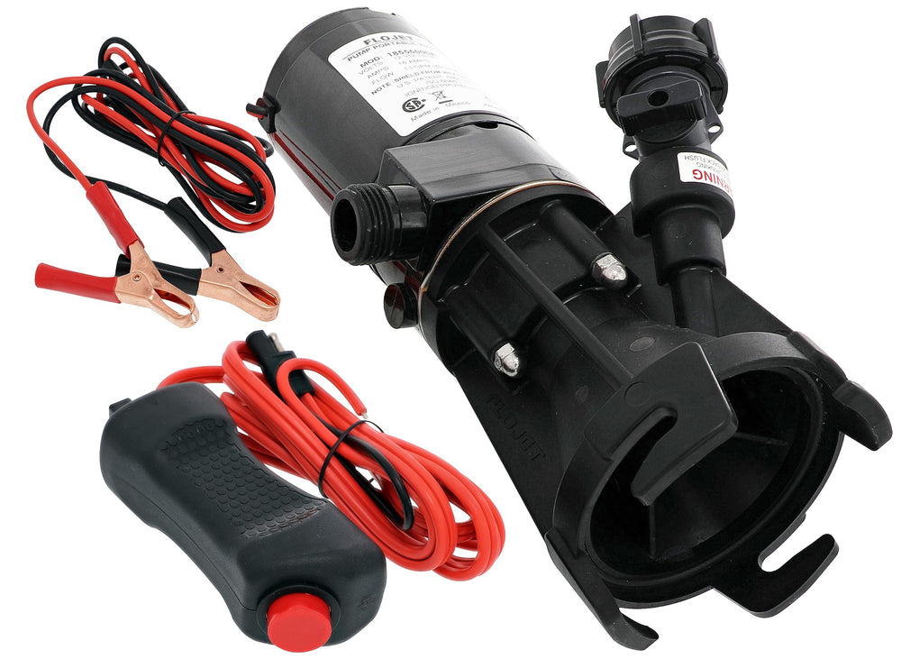 Flojet macerator pump connected to an RV tank for quick 30-gallon emptying.