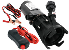 Flojet macerator pump connected to an RV tank for quick 30-gallon emptying.