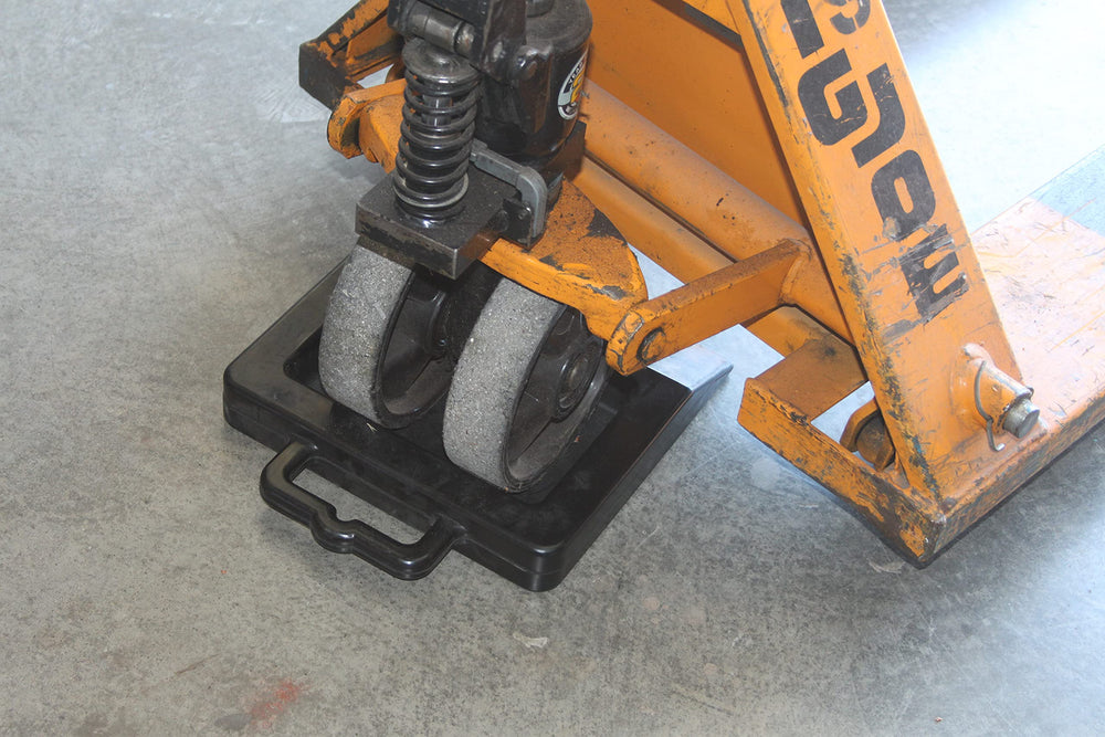 Foghorn Construction black pallet jack stop reduces movement during transit.