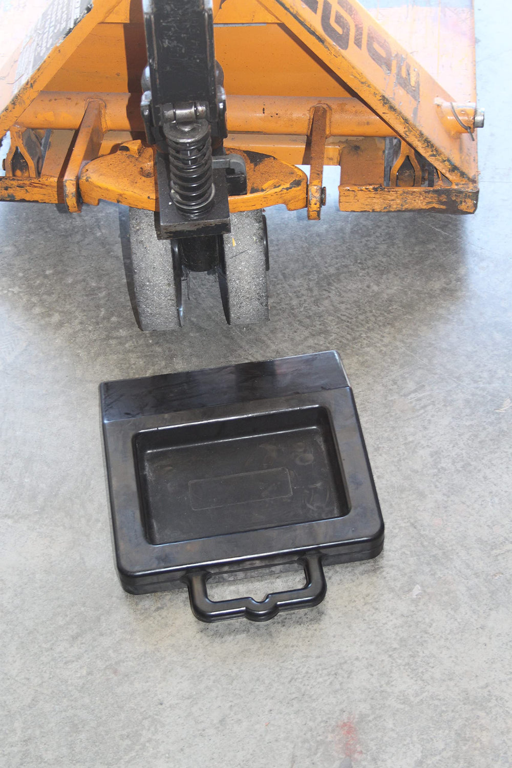 Foghorn Construction heavy rubber wheel chock provides traction on truck floors.