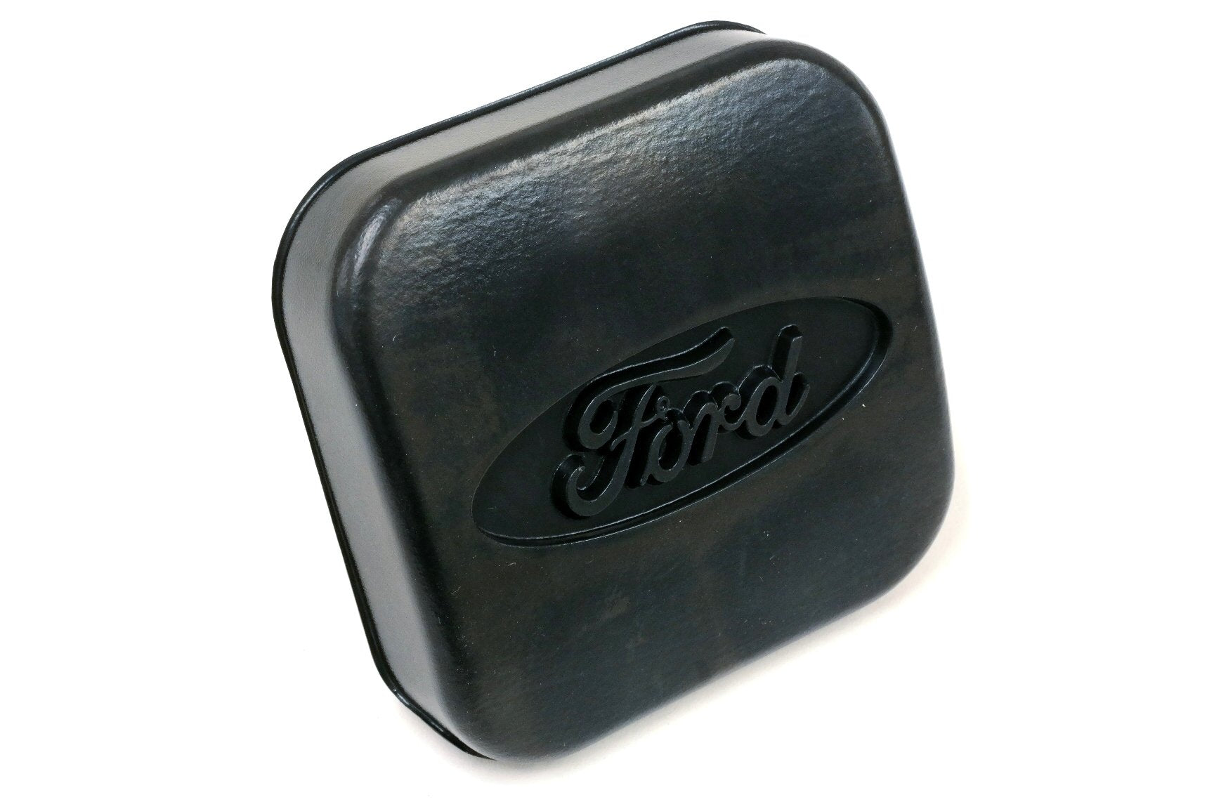 Ford hitch-cap on a vehicle demonstrates quick, clean coverage during travel.