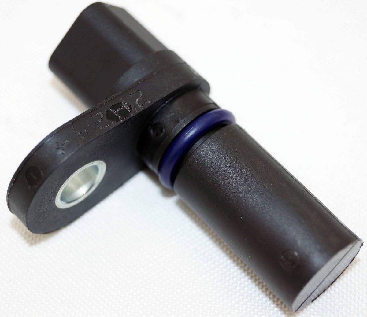 Ford Motorcraft camshaft position sensor backplate ready for alignment