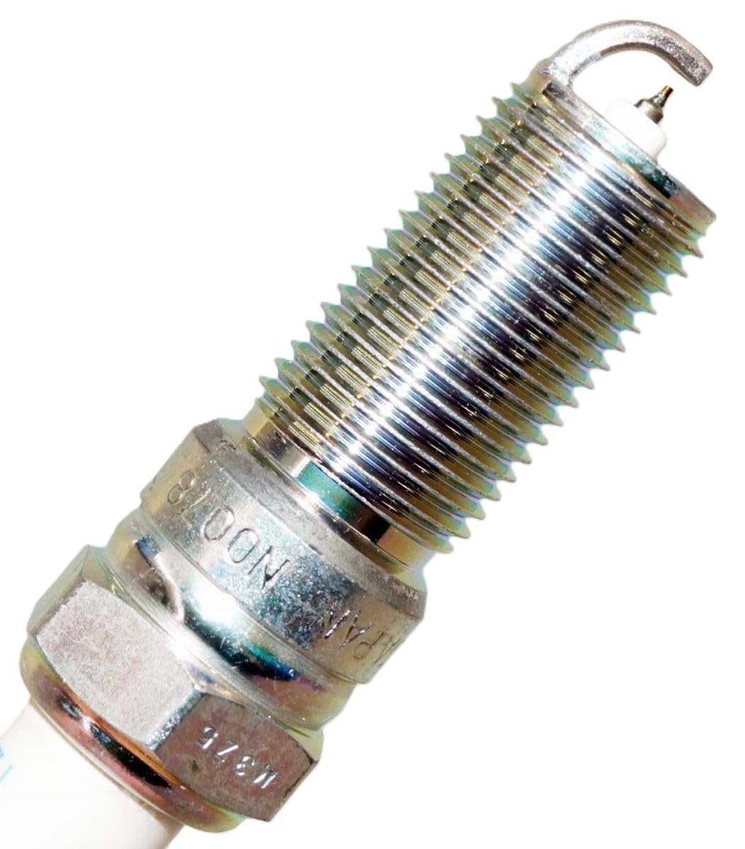 Ford SP594 iridium spark plug installed in engine demonstration image