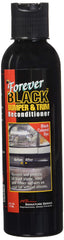 Forever Black bumper-trim bottle shows permanent recolor on black plastic surfaces.