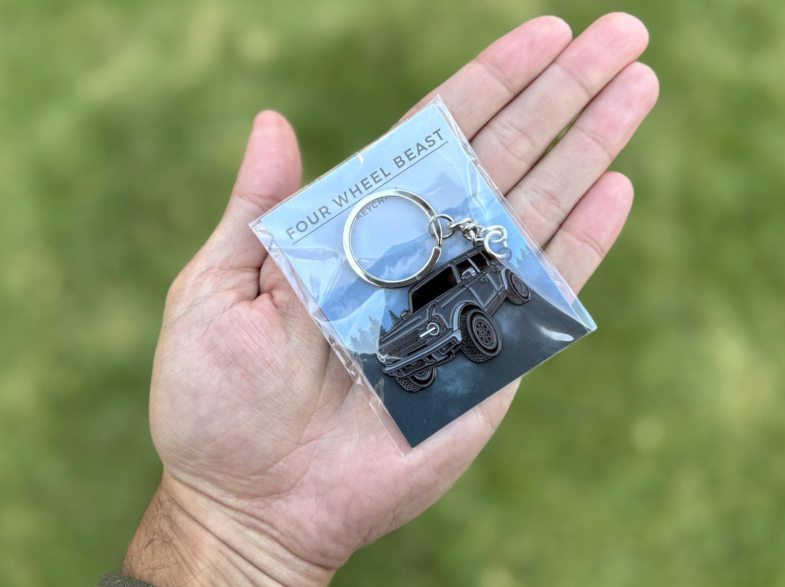 FOUR WHEEL BEAST Bronco keychain fits multiple Bronco models across years.