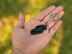 FOUR WHEEL BEAST Dodge Challenger keychain back view highlights enamel detailing for bold style