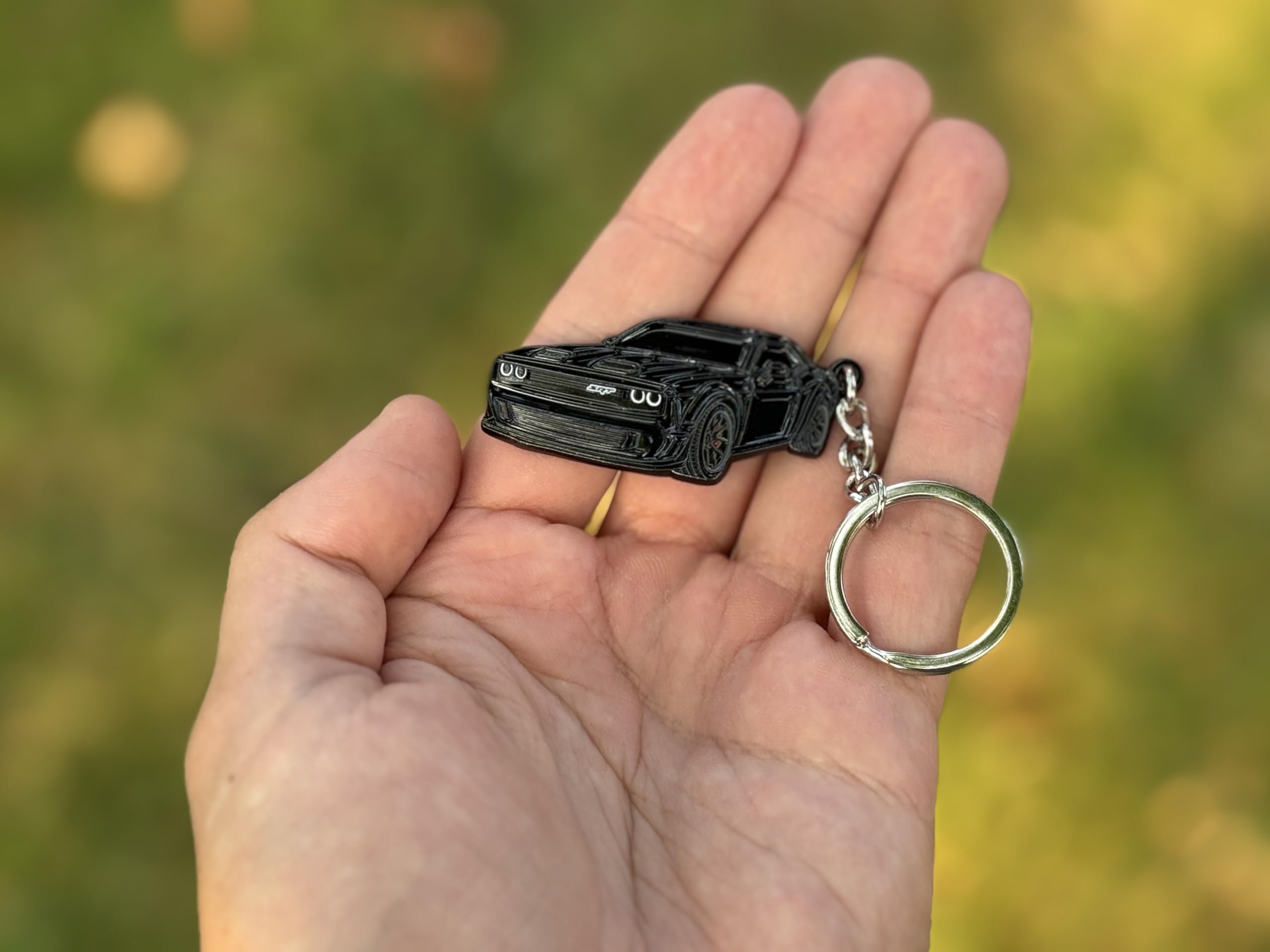 FOUR WHEEL BEAST Dodge Challenger keychain side detail demonstrates compact size for pocket carry