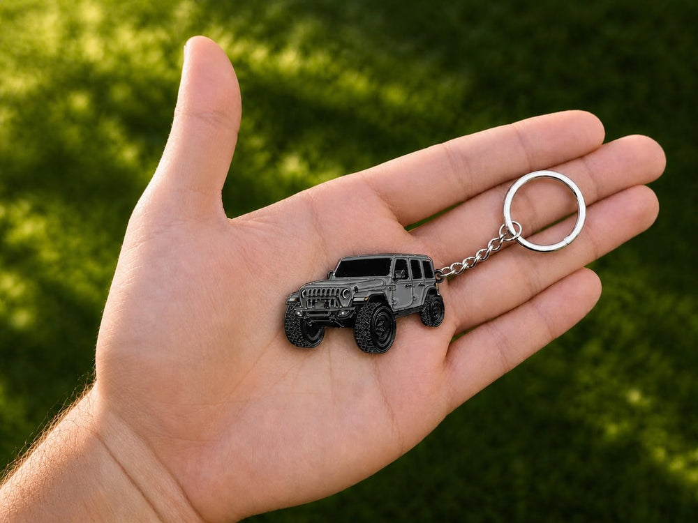 FOUR WHEEL BEAST keychain in metal enamel finish stays sturdy on key rings.