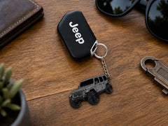 Officially licensed Jeep Wrangler keychain by FOUR WHEEL BEAST with authentic styling.
