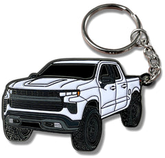 Four Wheel Beast metal keychain white front view, durable enamel detail for Chevy Silverado.