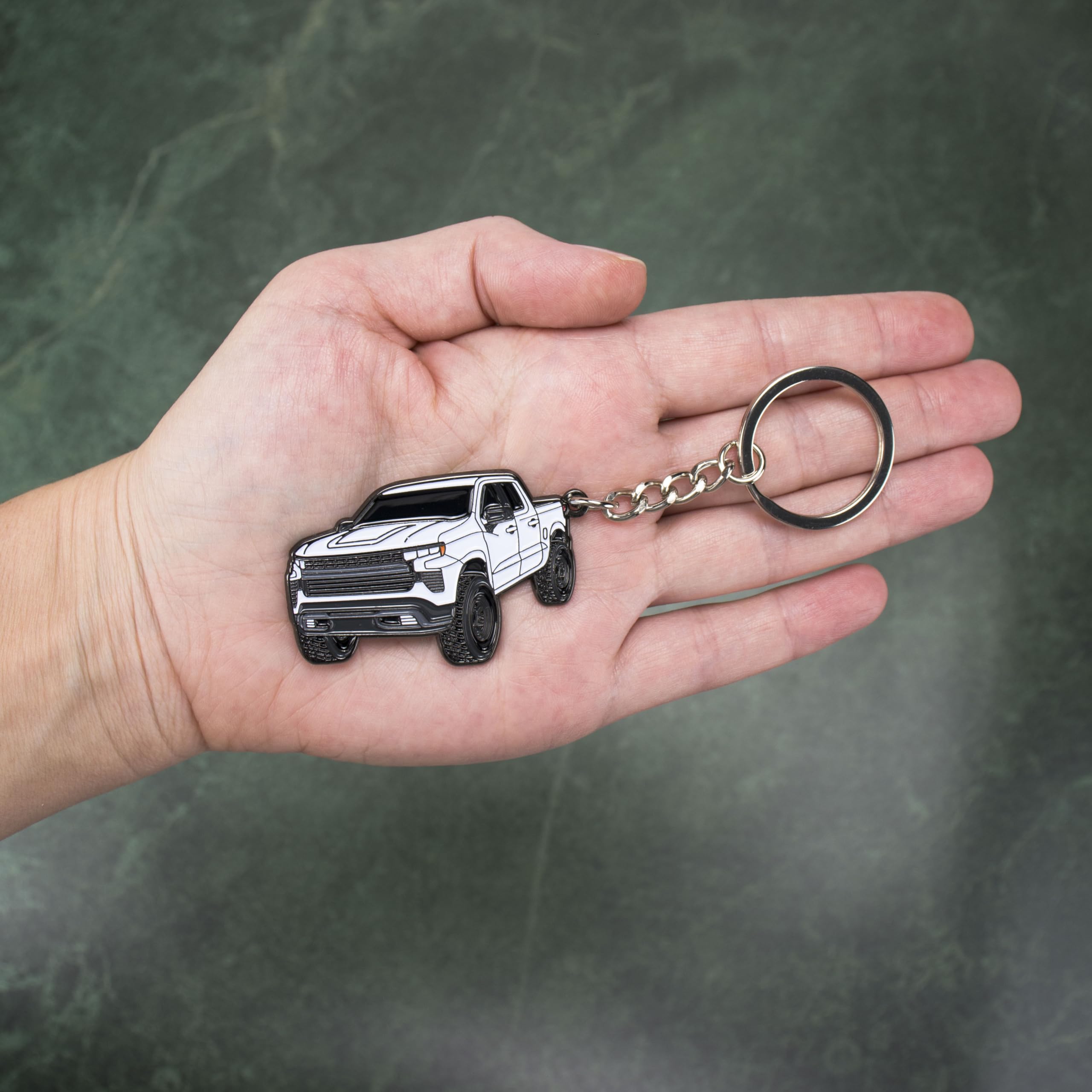 Four Wheel Beast keychain white side view, compact portable Chevy truck accessory.
