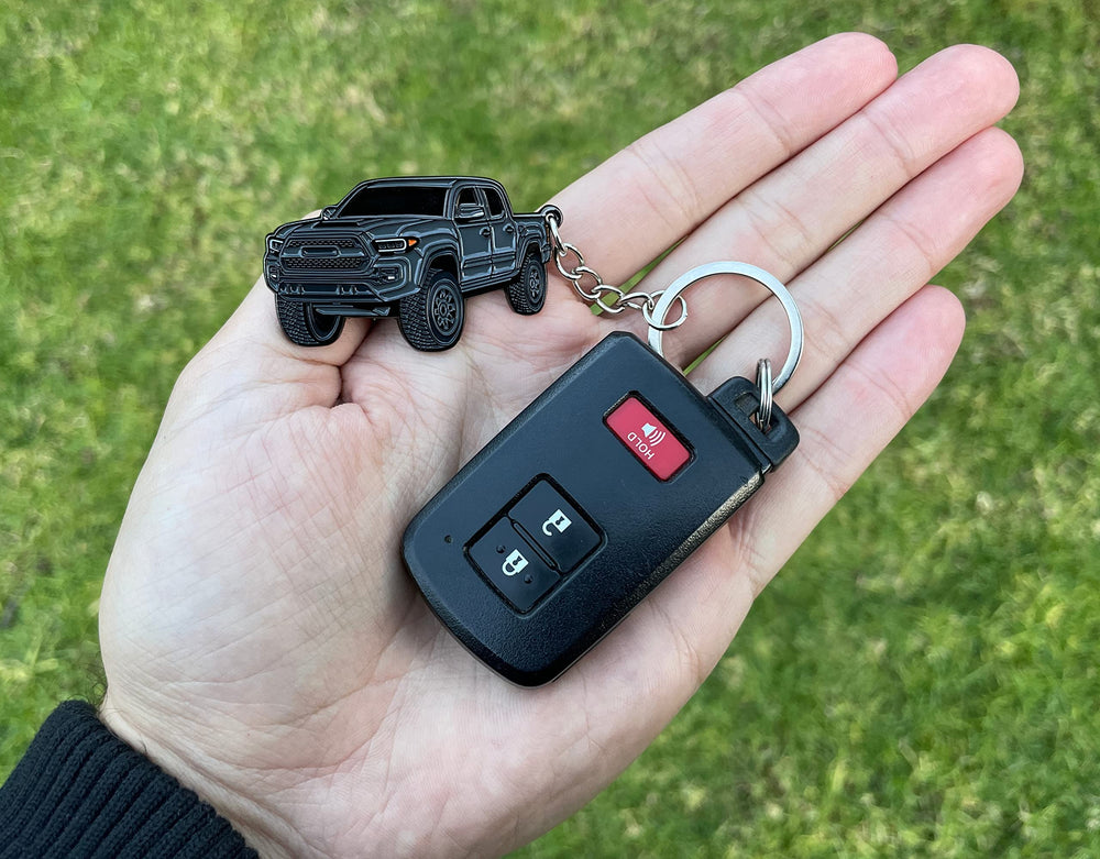 Gift-ready Four Wheel Beast Tacoma keychain for any Tacoma owner.