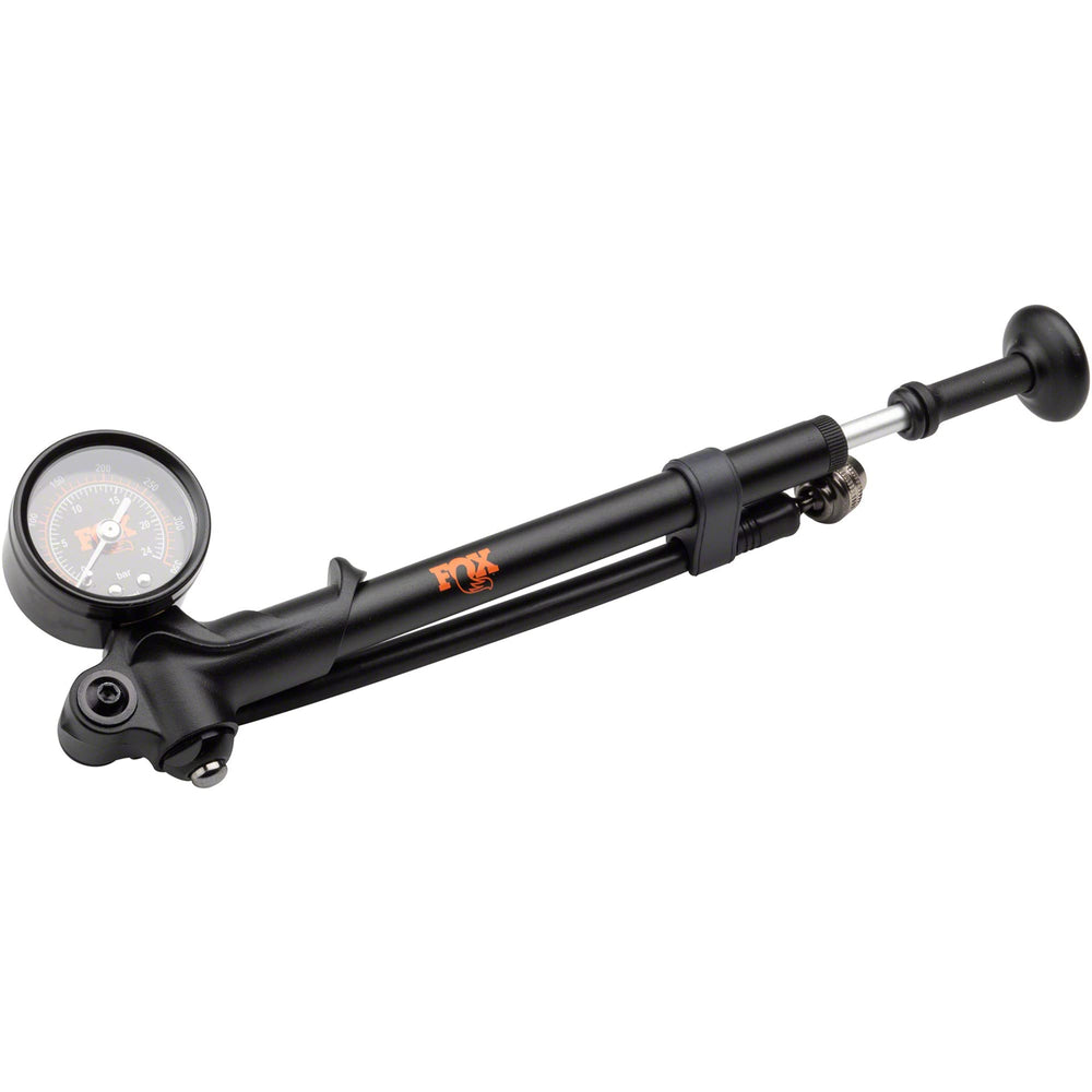 FOX Factory high-pressure shock pump with bleed valve and swivel head for precise suspension tuning.