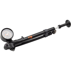 FOX Factory high-pressure shock pump with bleed valve and swivel head for precise suspension tuning.