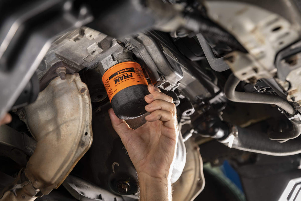 Engine installation scene with FRAM filter ready for service