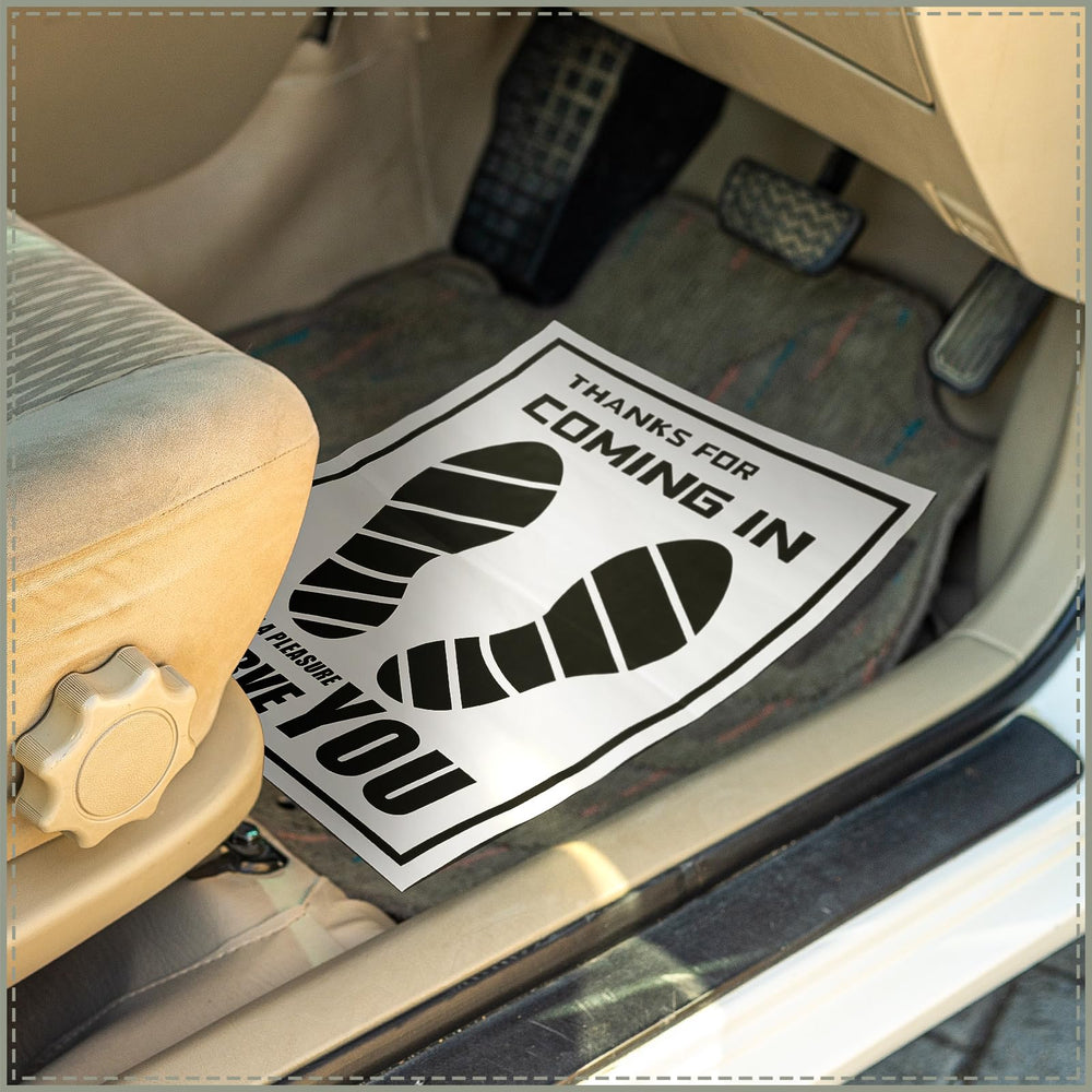 Frienda white disposable mats in a bulk pack for quick interior protection
