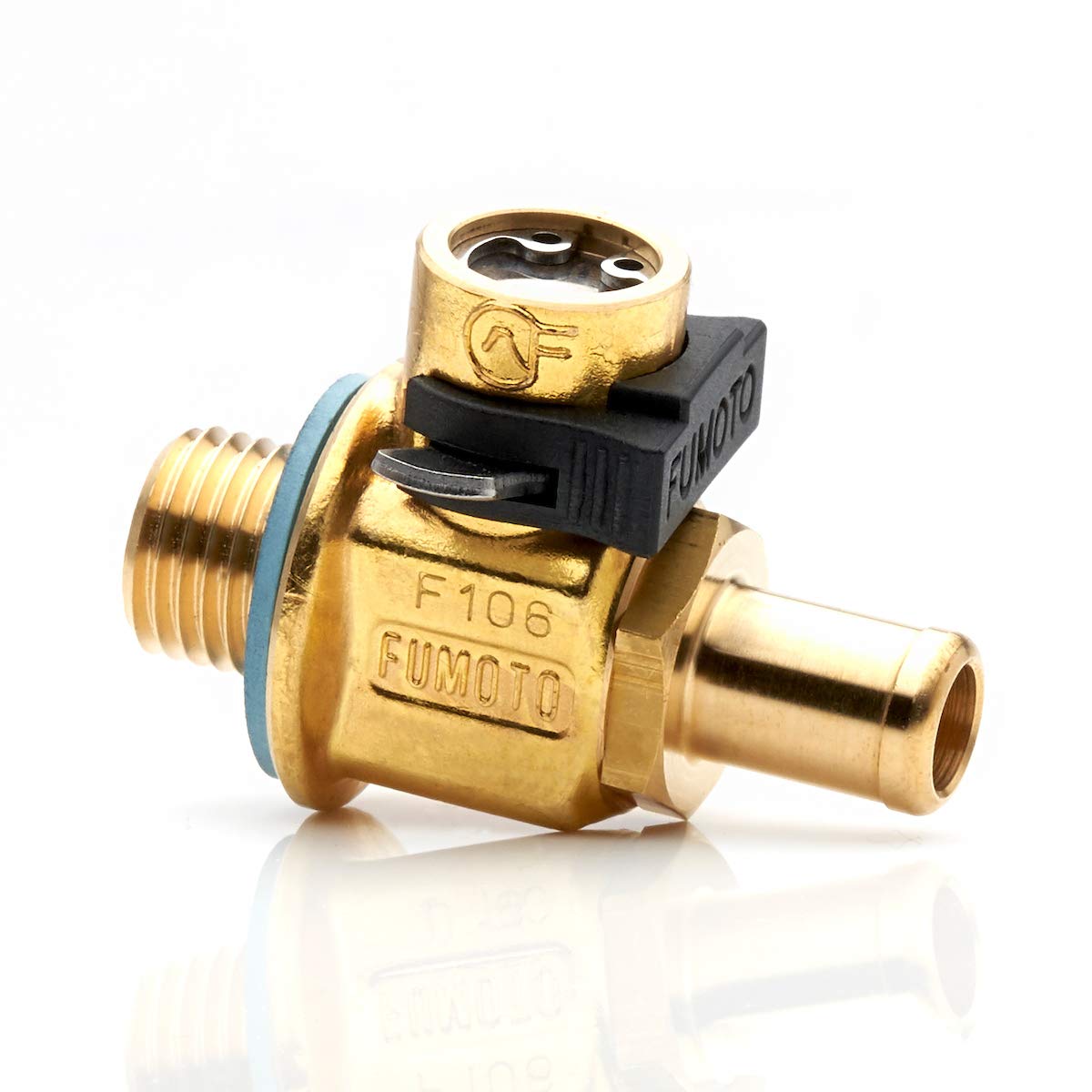 Fumoto F103N lever-clip close-up shows effortless tool-free operation for fast oil drains.