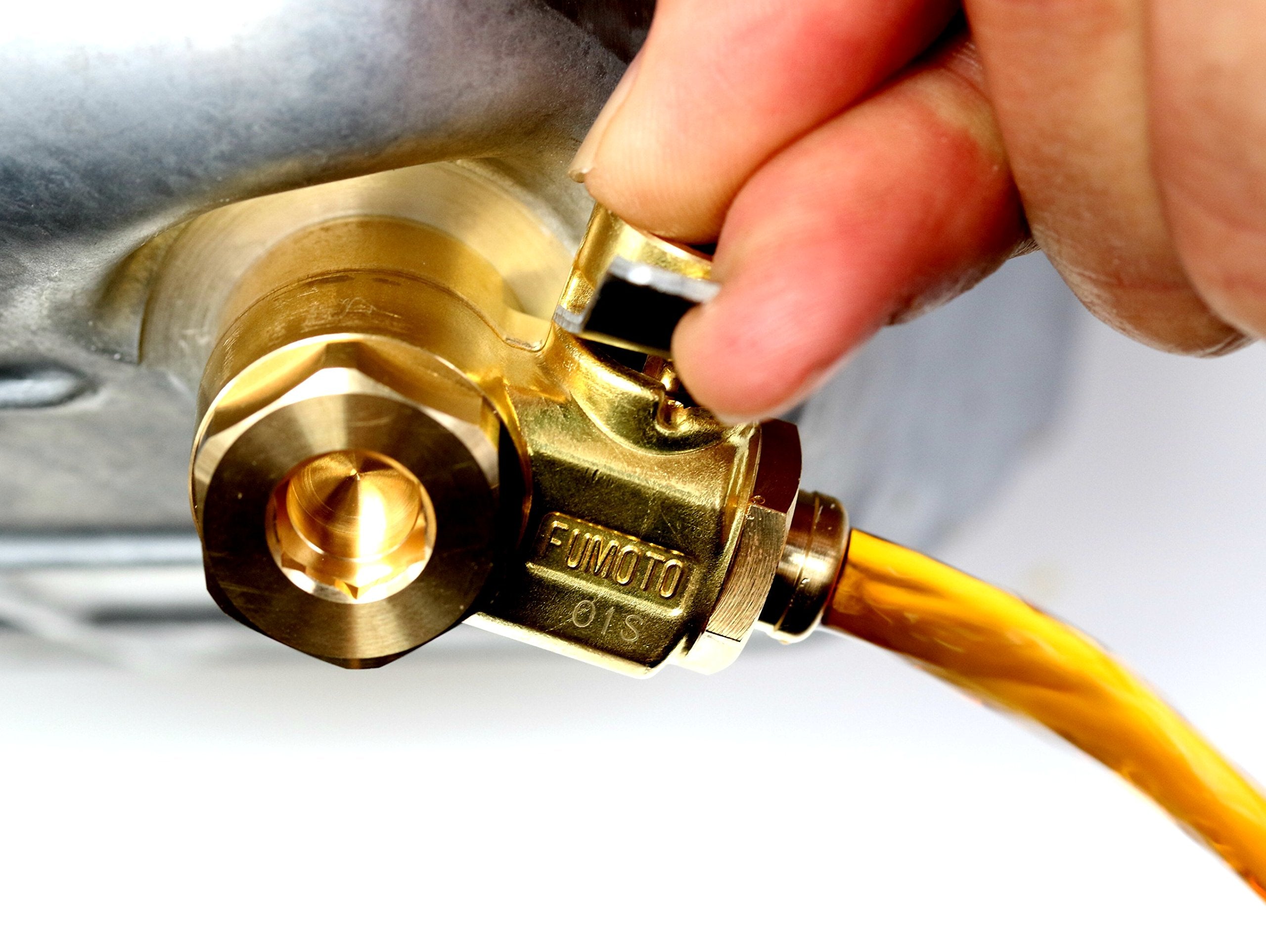 Compact packaging of F103SX valve with quick-start guide.