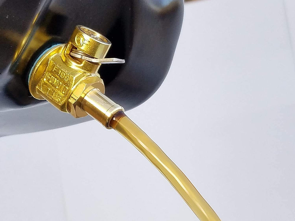 Fumoto F106N installed on engine enabling quick one-touch drainage