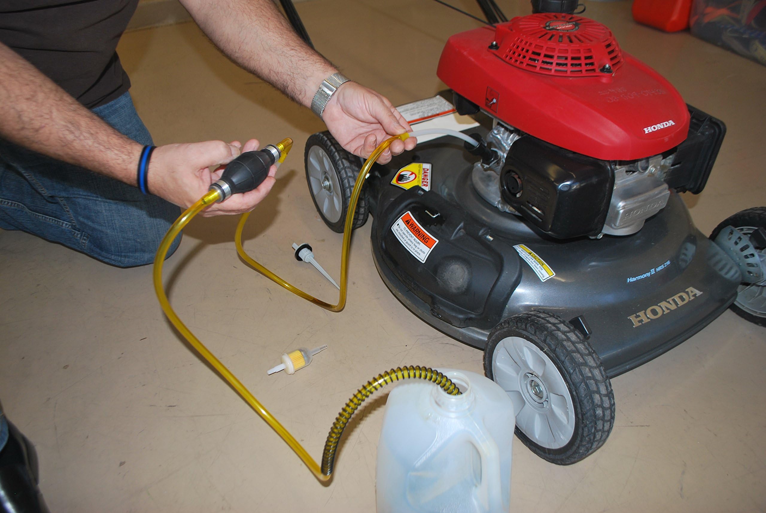 GasTapper spill-proof clip secures the hose during operation.