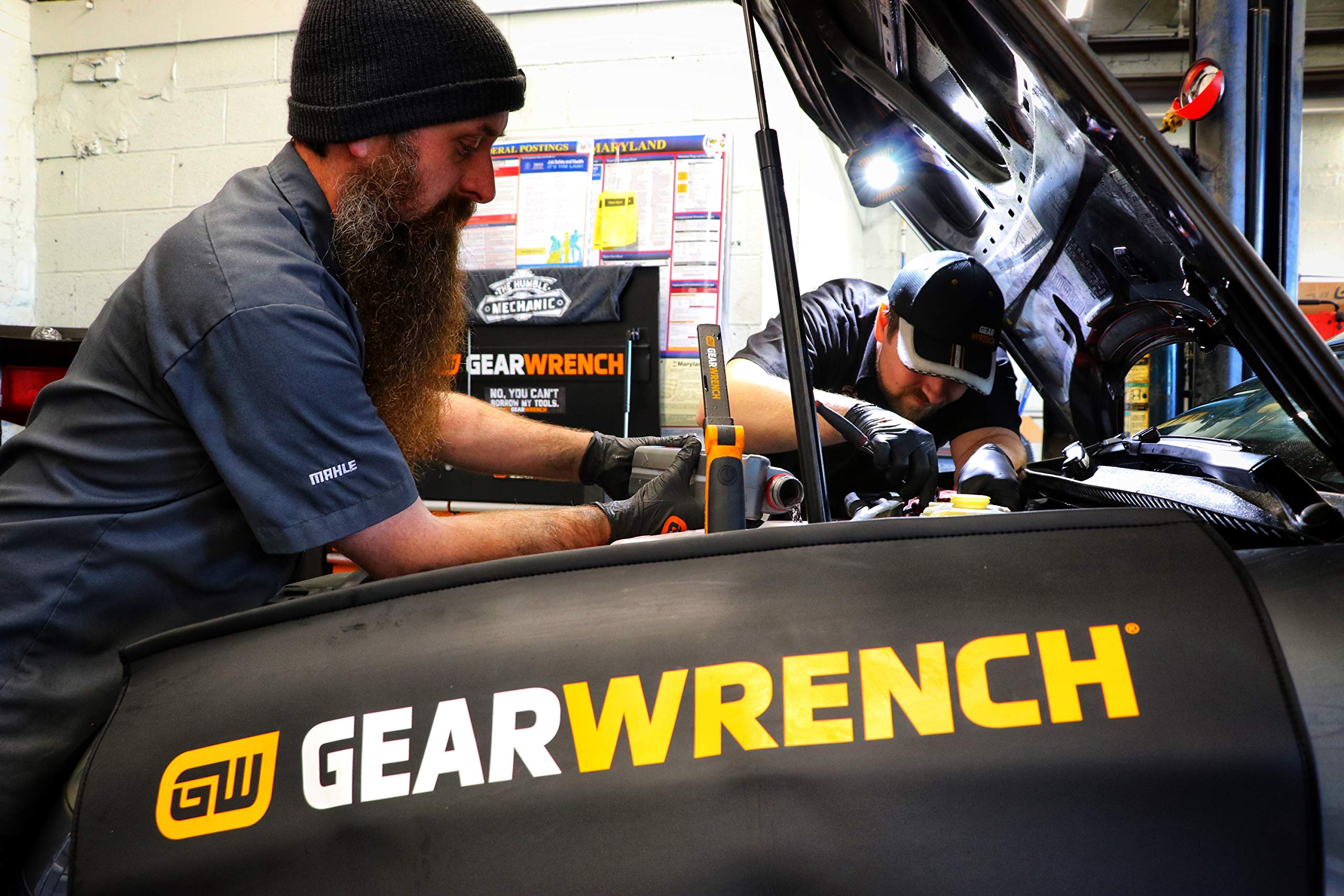 GEARWRENCH fender cover resists oil and solvents while protecting the bay.