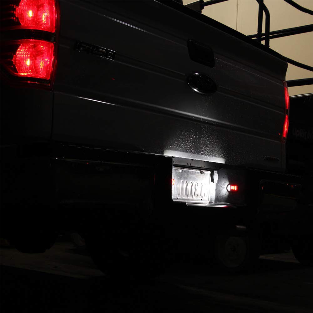 Gempro license plate light on Bronco shown from side angle highlighting beam reach.