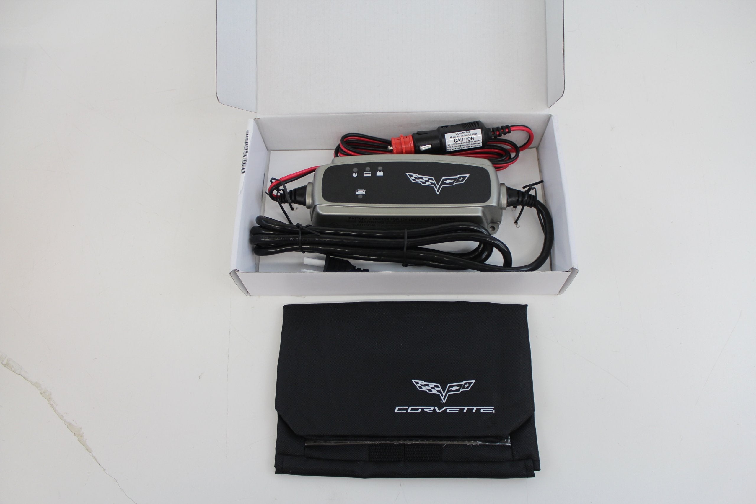 General Motors GM 20929740 110V charger, side view; ideal for keeping Corvette batteries charged on the go.