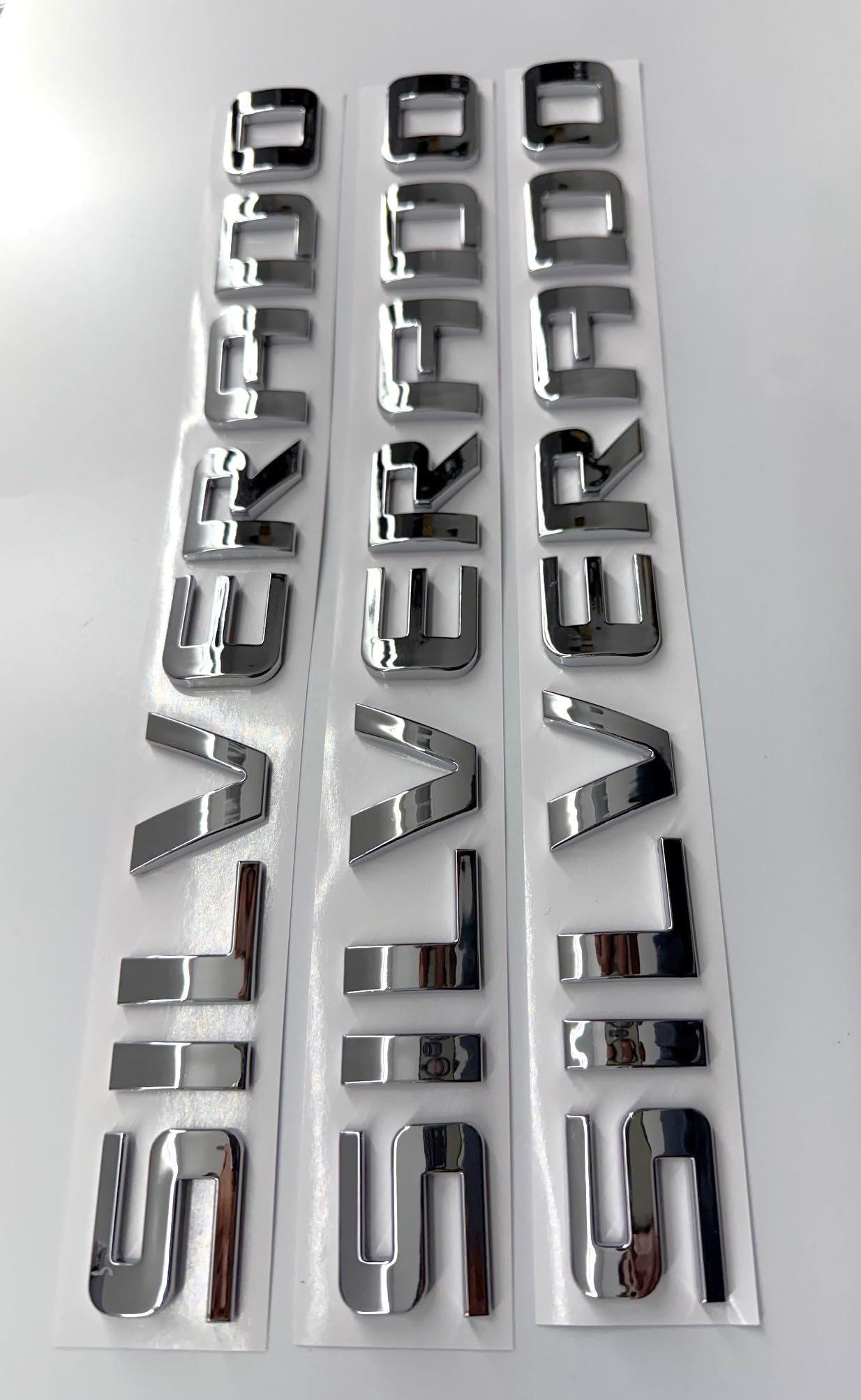 Generic 3PCS badge emblems chrome silver rear view on Canyon/Sierra