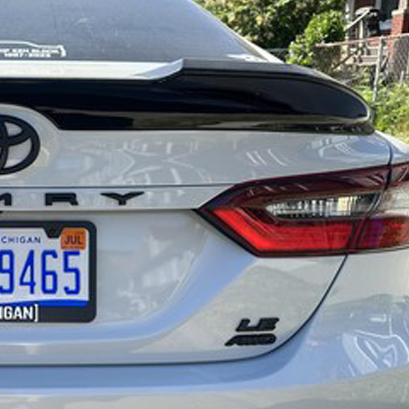Generic emblem overlay offers bold matte finish and durable adhesion for Camry XSE.