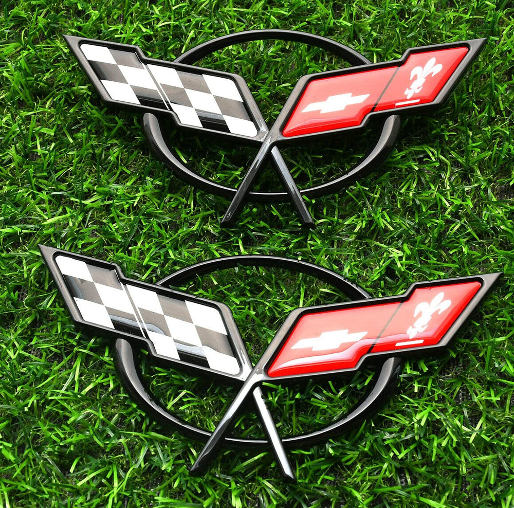 Generic Corvette C5 front emblem with 3D crossed flags in black red adds authentic styling.