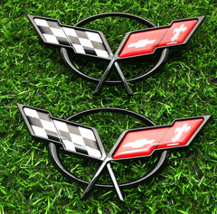 Generic Corvette C5 front emblem with 3D crossed flags in black red adds authentic styling.