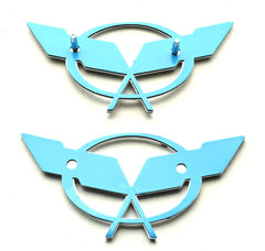 Generic Corvette C5 rear deck lid emblem with 3D crossed flags enhances exterior detail.