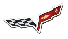 Generic Corvette emblem close-up showing ABS/PC craftsmanship and chrome-red shine.