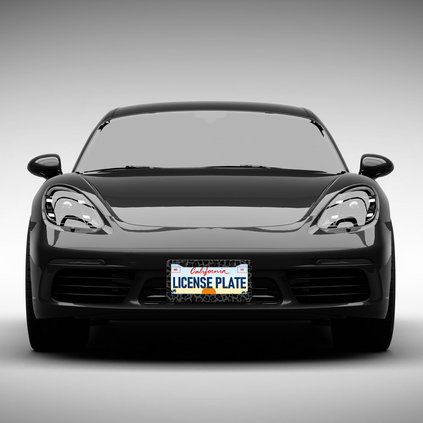 Leopard-print license plate frame installed on a car for standout appeal.