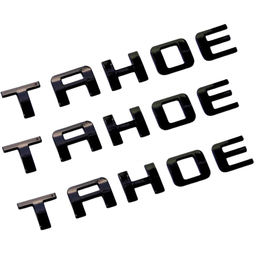 Generic Tahoe emblems front view with glossy black finish for bold styling.